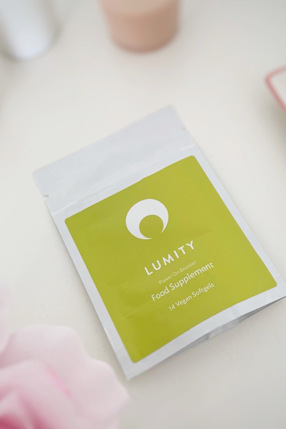 a packet of Lumity Power On Boosters sitting on the side