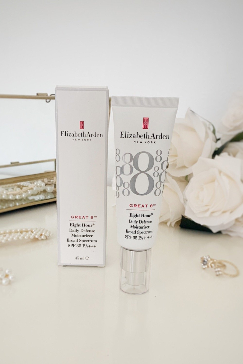 a tube of the Elizabeth Arden Great 8 daily defence moisturizer next to the box