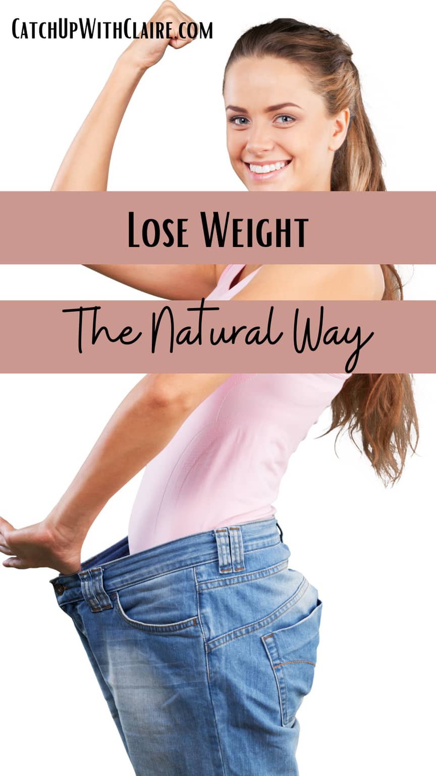 a lady wearing trousers far too large after she decided to lose weight